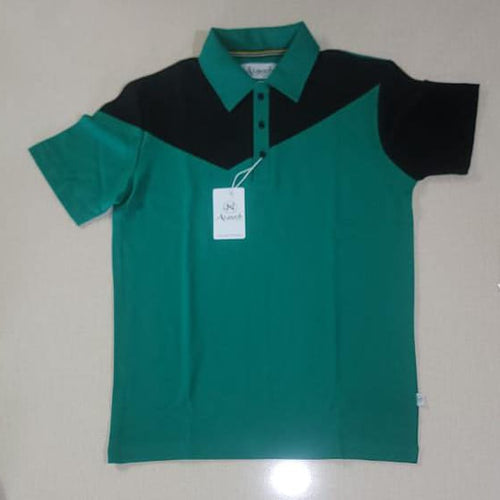 Green and black polo shirt with a tag on a light gray background